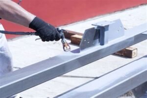 Fire retardant coating applied to PUF panel underside for improved fire protection