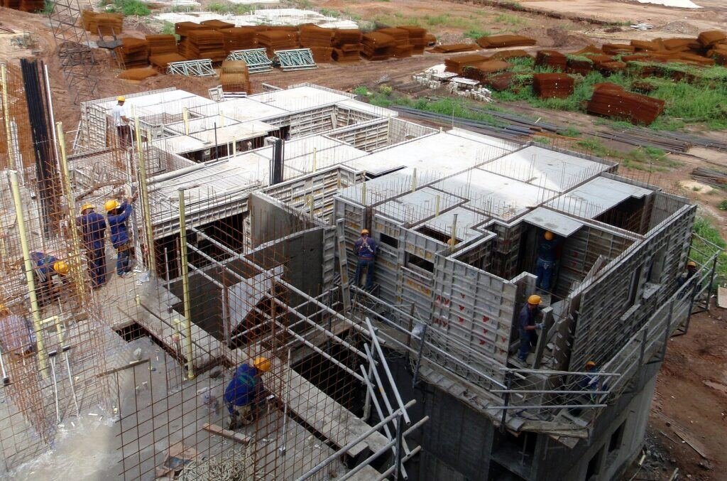 Formwork panels set out on a slab following the structural layout