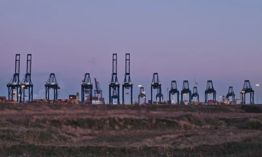 Container cranes loading freight at a European container terminal